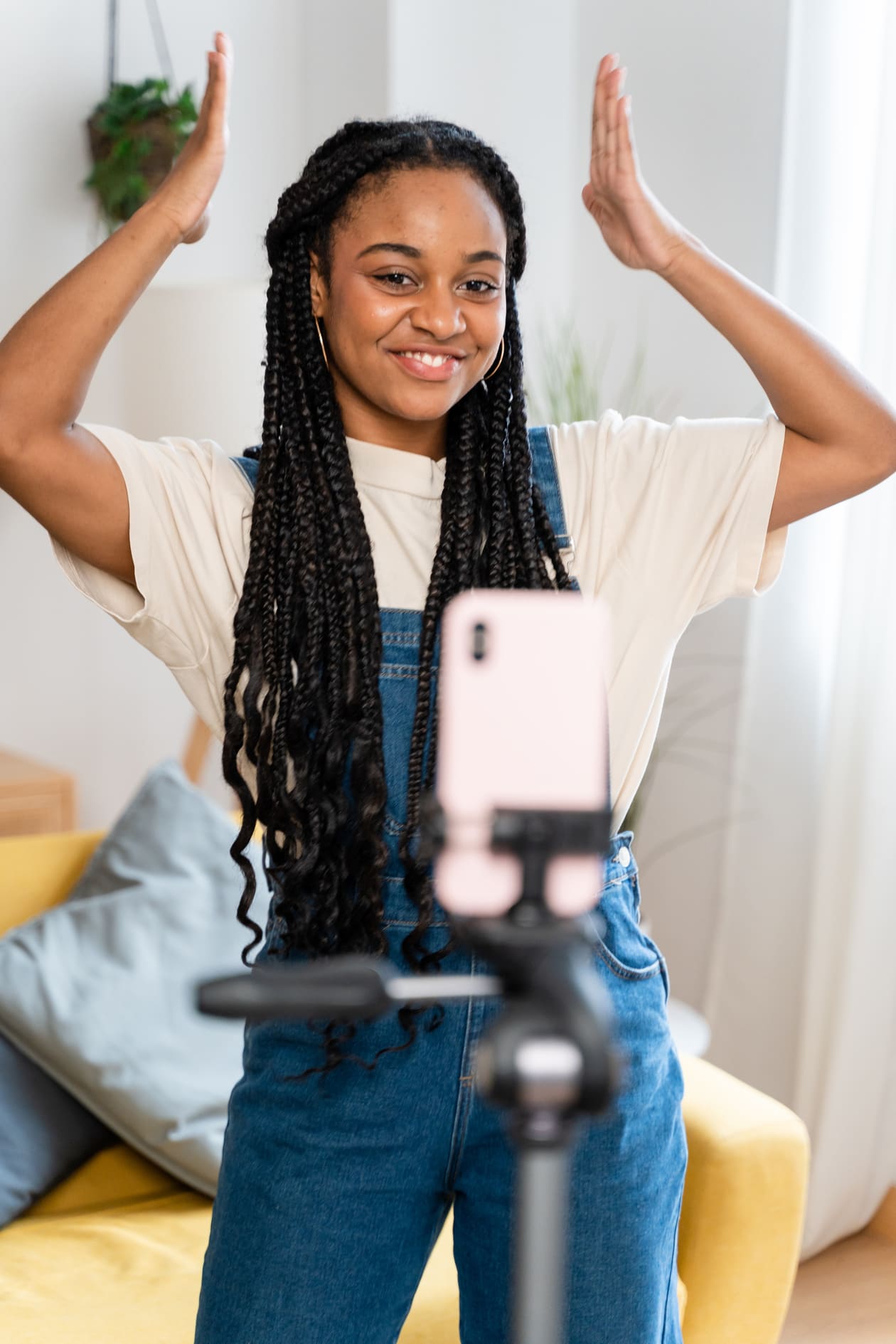 Creator filming herself with a phone